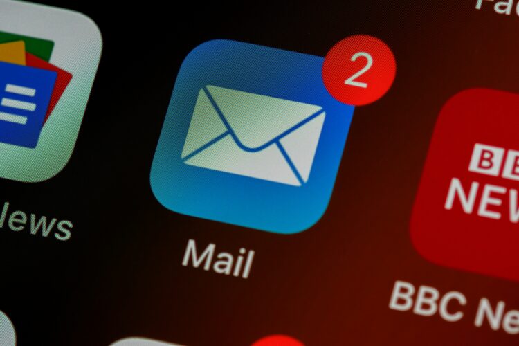 A close-up of an email app icon with unread message notifications, representing efficient email automation strategies for marketers to enhance engagement and outreach. - AI Marketing Tools A close-up of an email app icon with unread message notifications, representing efficient email automation strategies for marketers to enhance engagement and outreach.