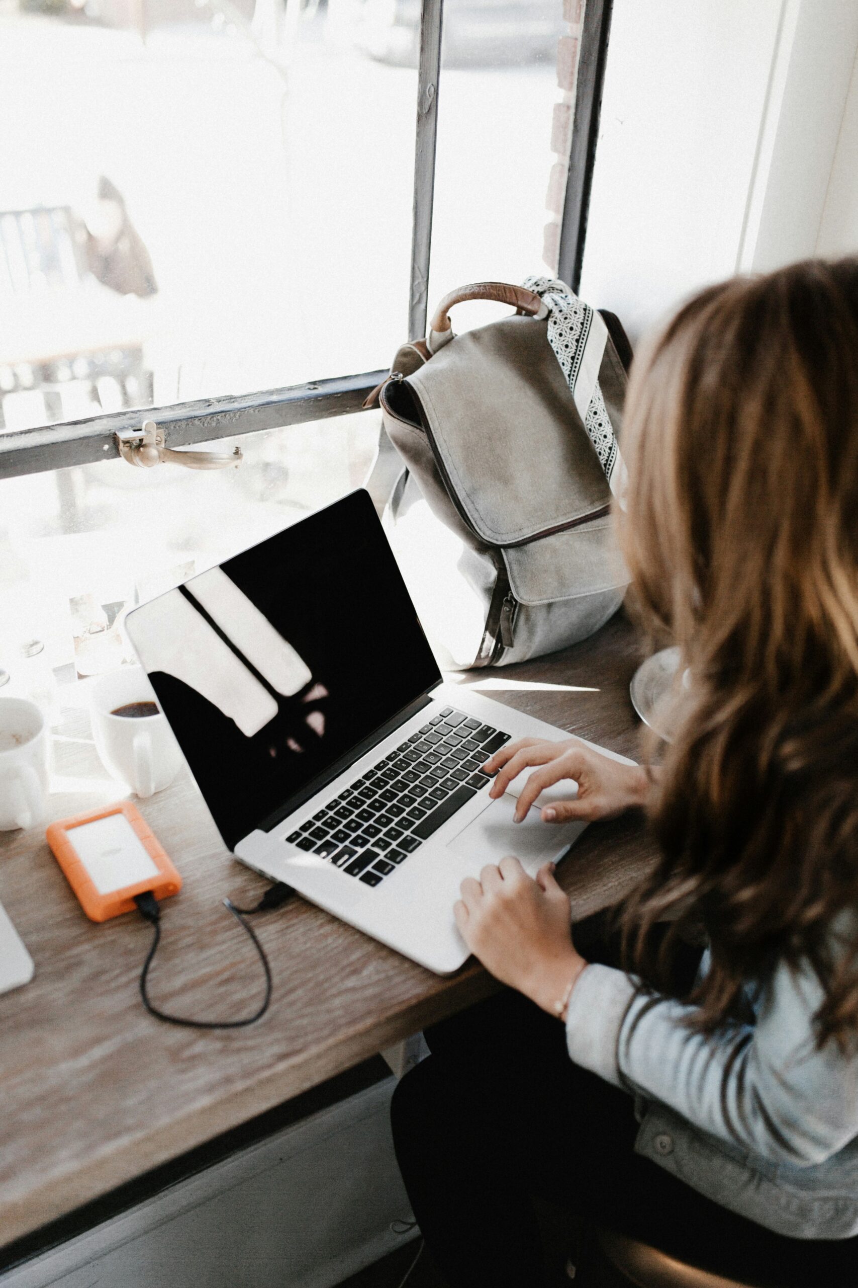 a woman using a laptop