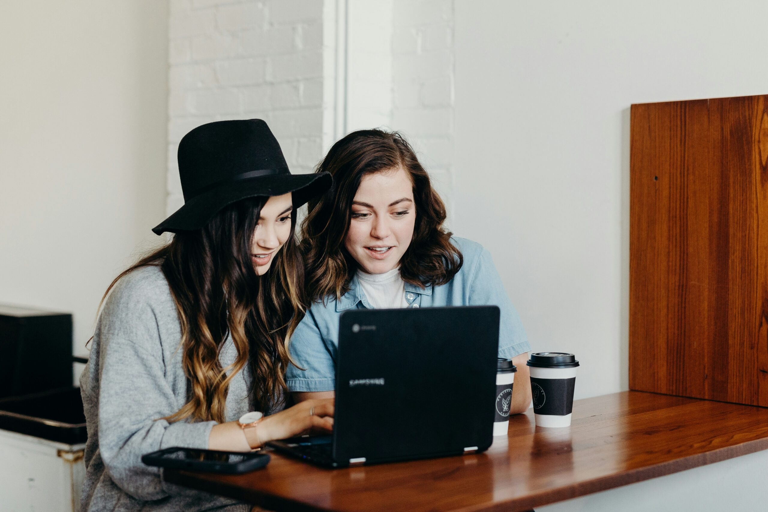 women working on a laptop