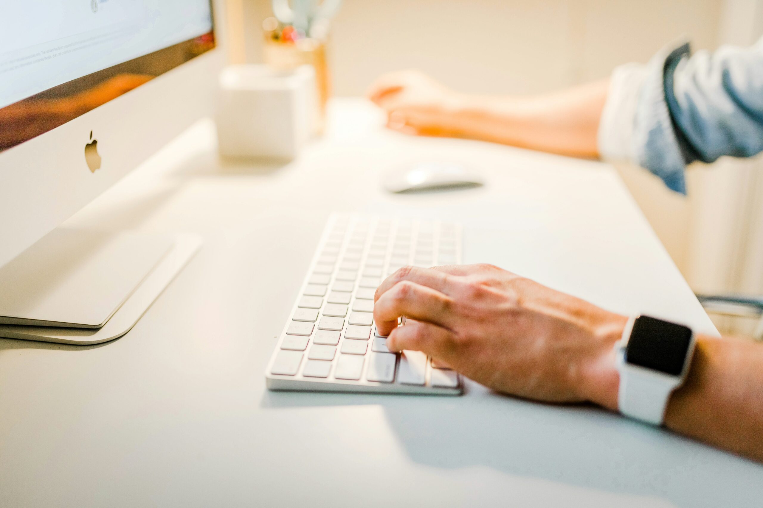 a person writing SEO Content with a keyboard