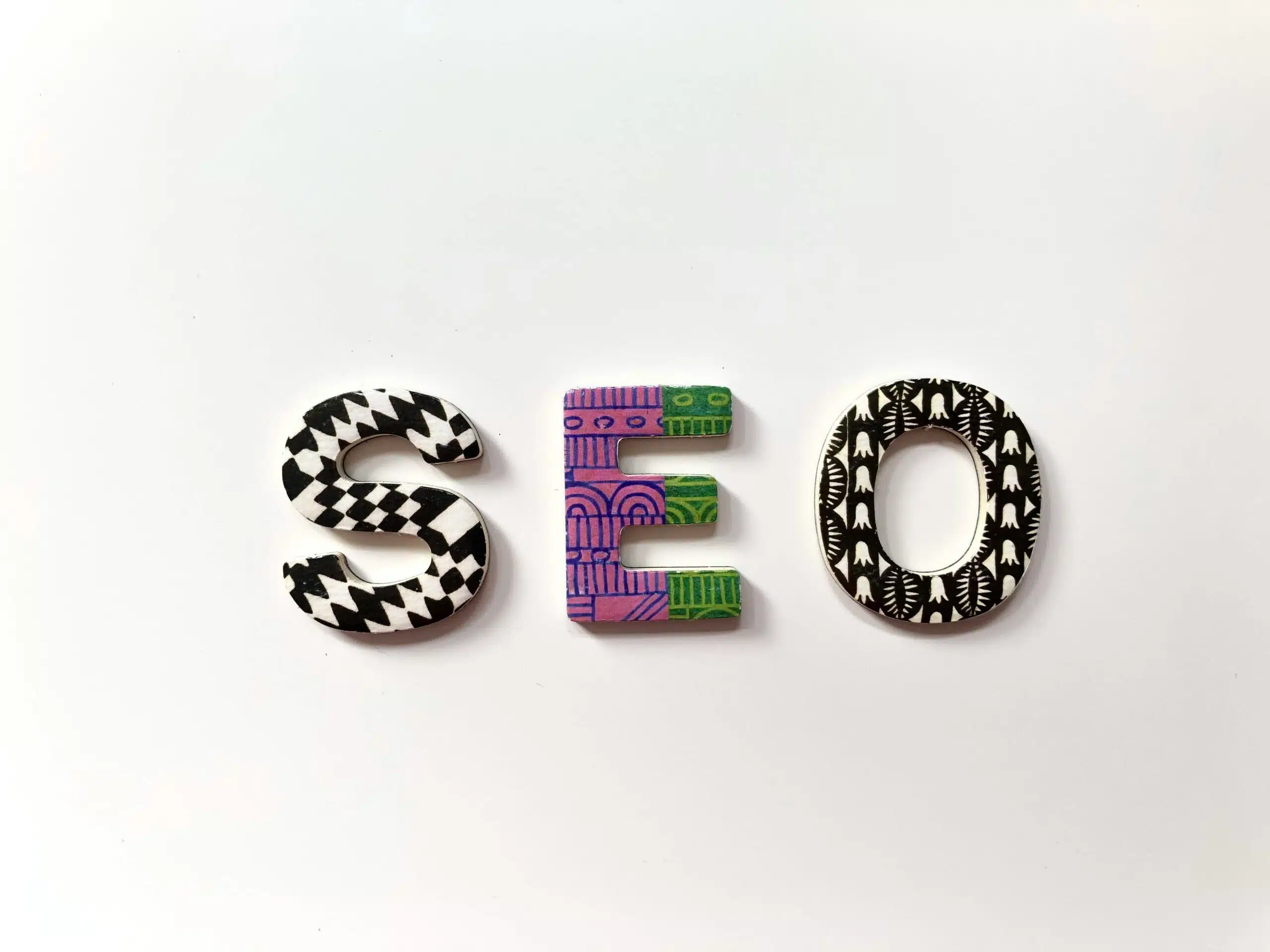 Patterened SEO initials on a white background