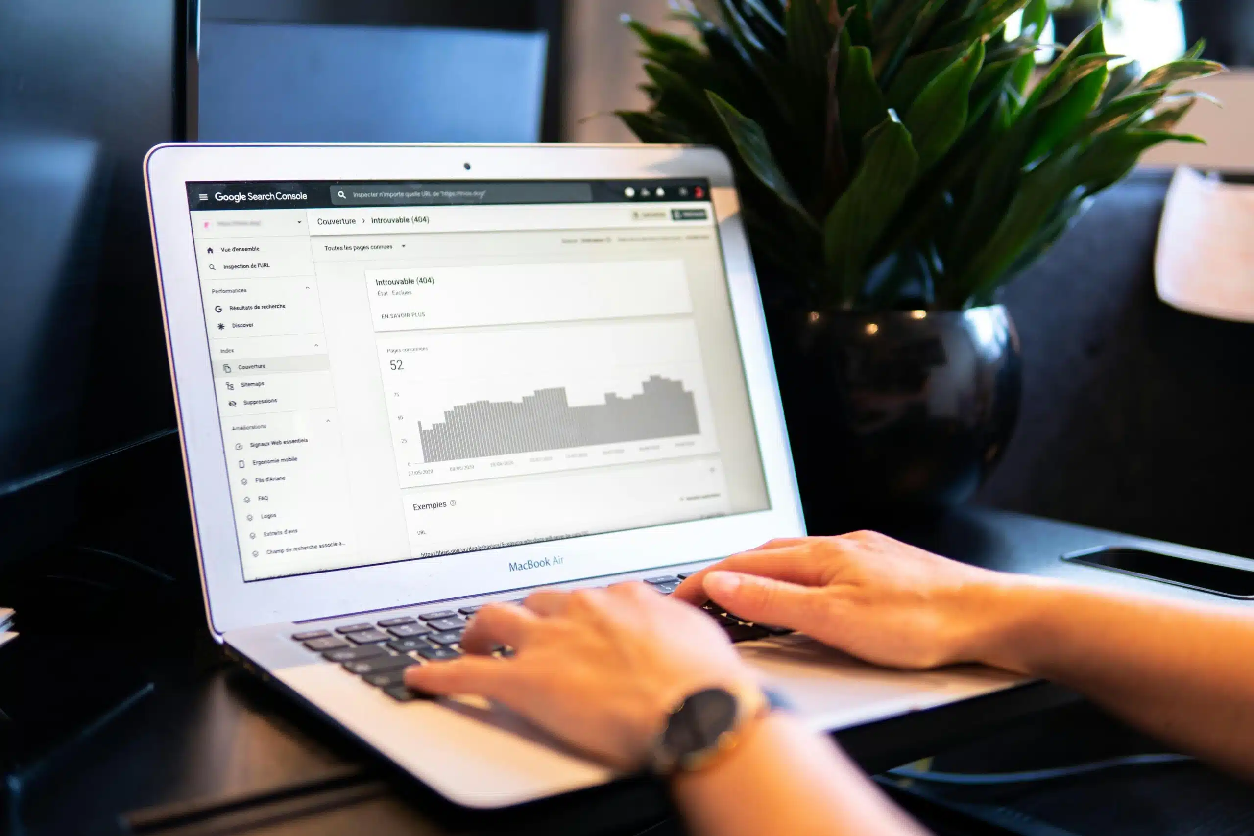 A person analyzing AI-generated marketing insights on a laptop 