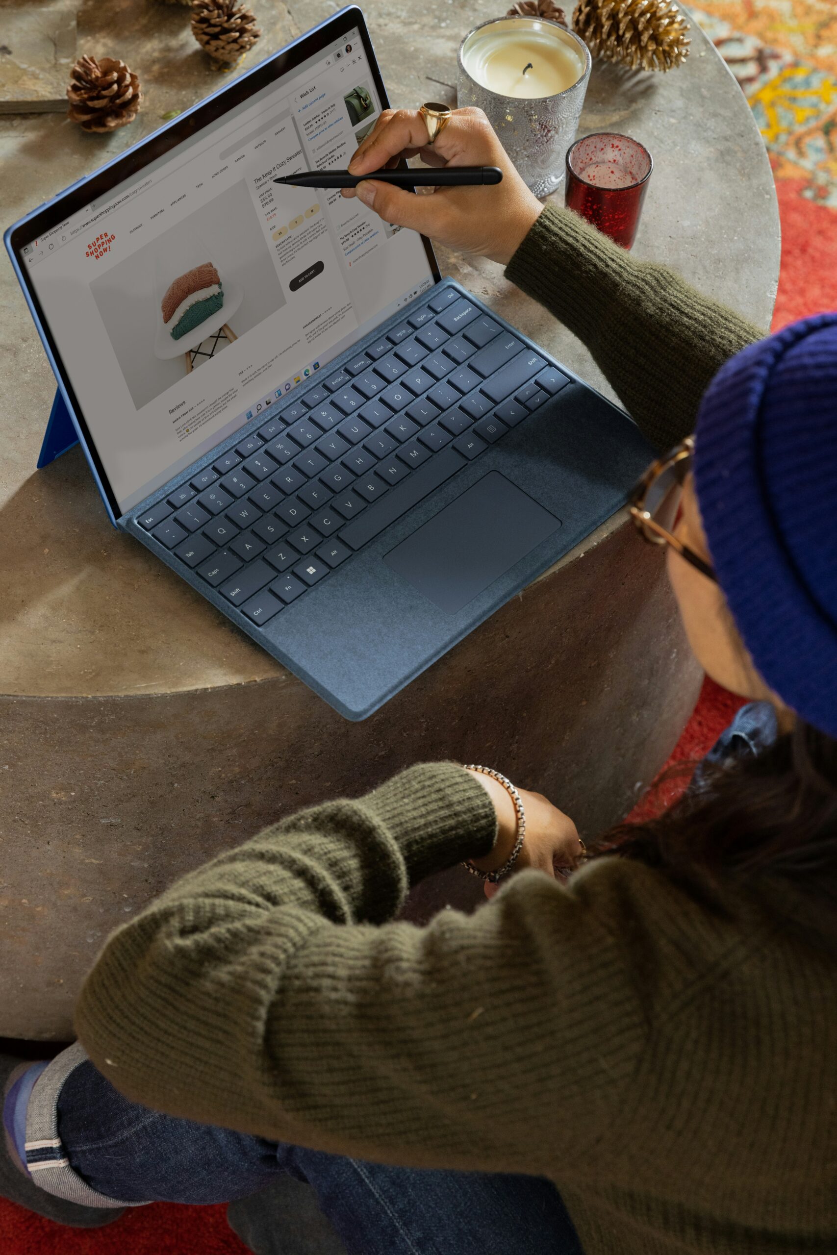  Person using a stylus on a tablet at a wooden table, illustrating AI writing tools for business use.