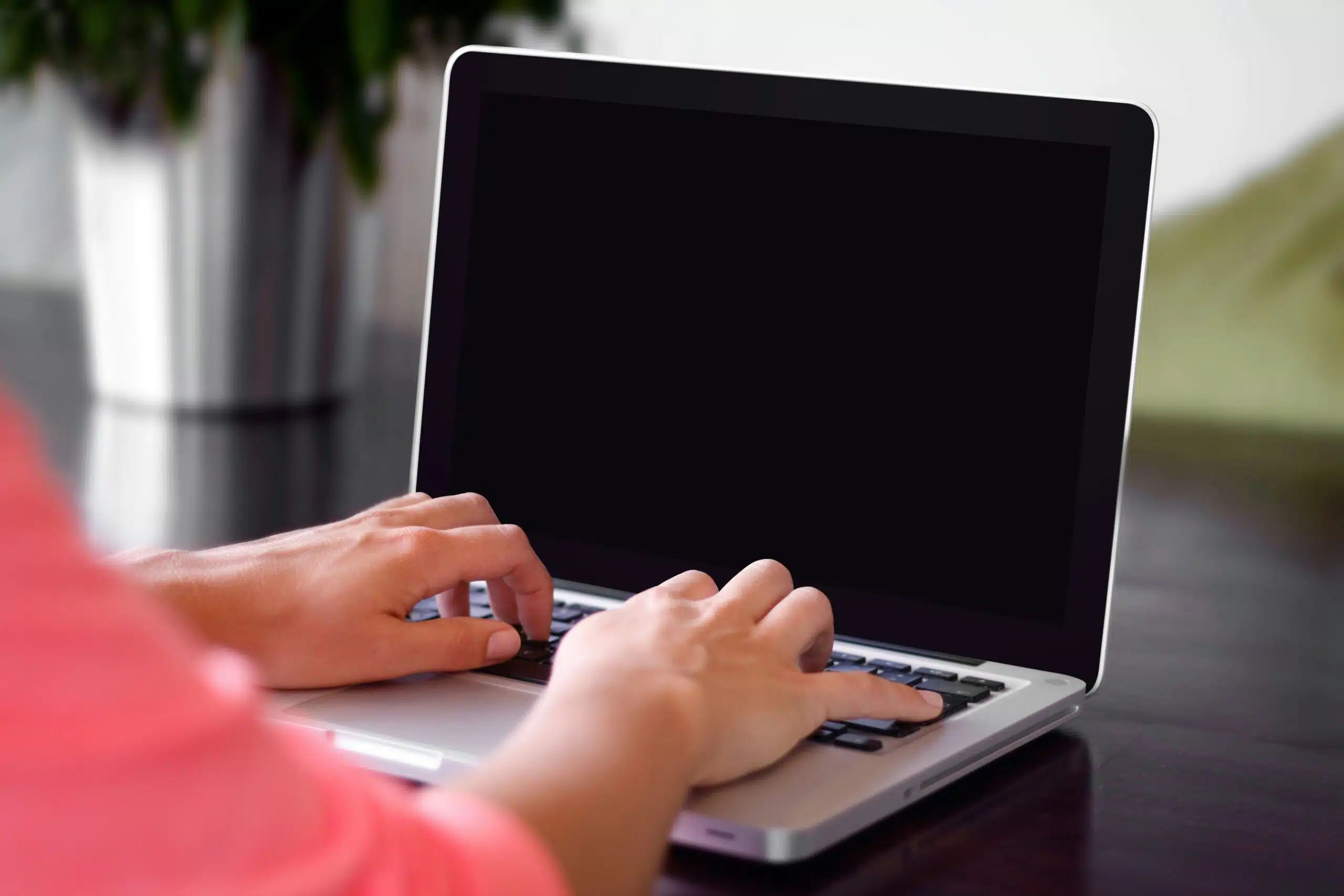 a woman using laptop