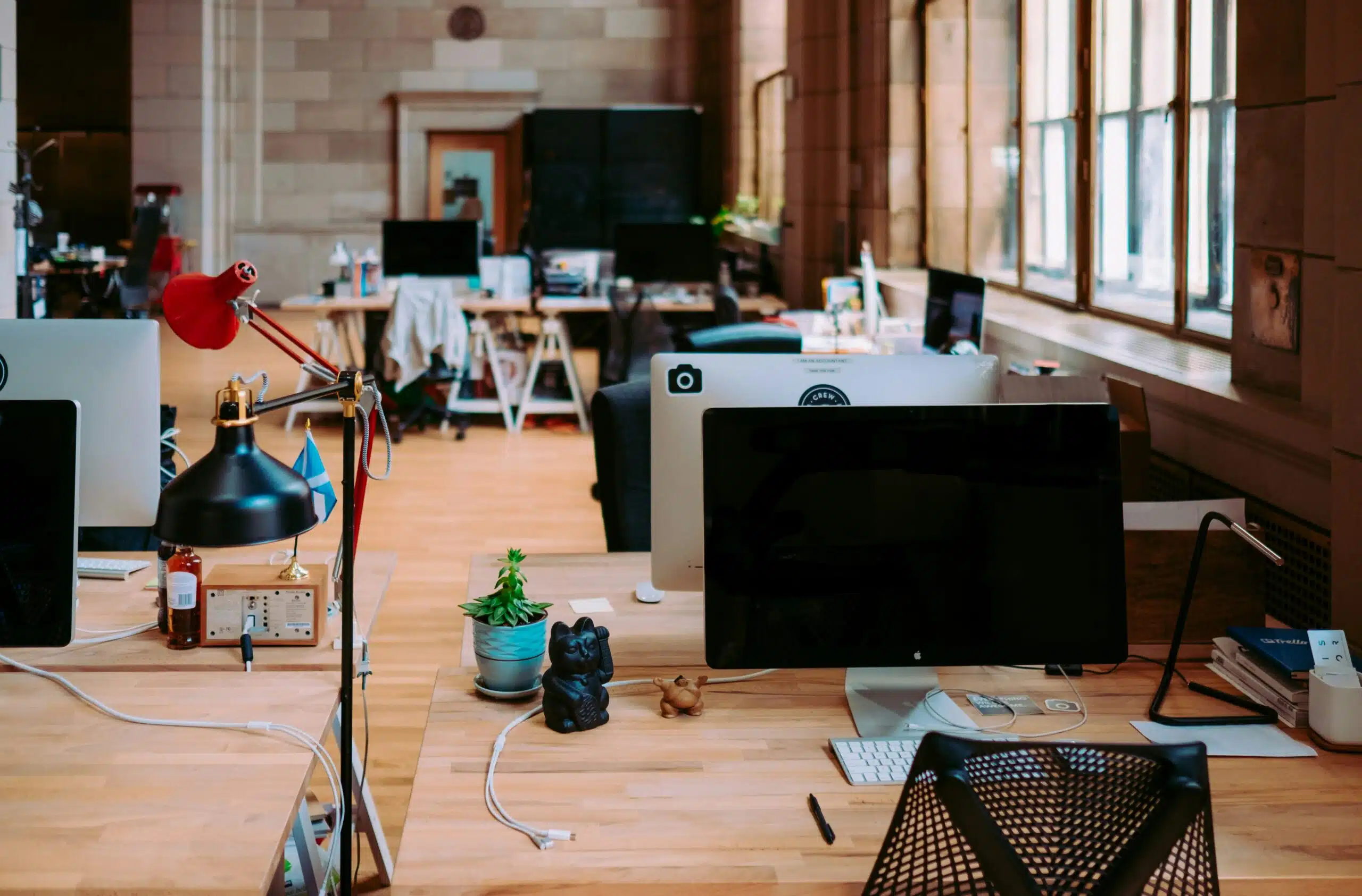an office space with desktop computers