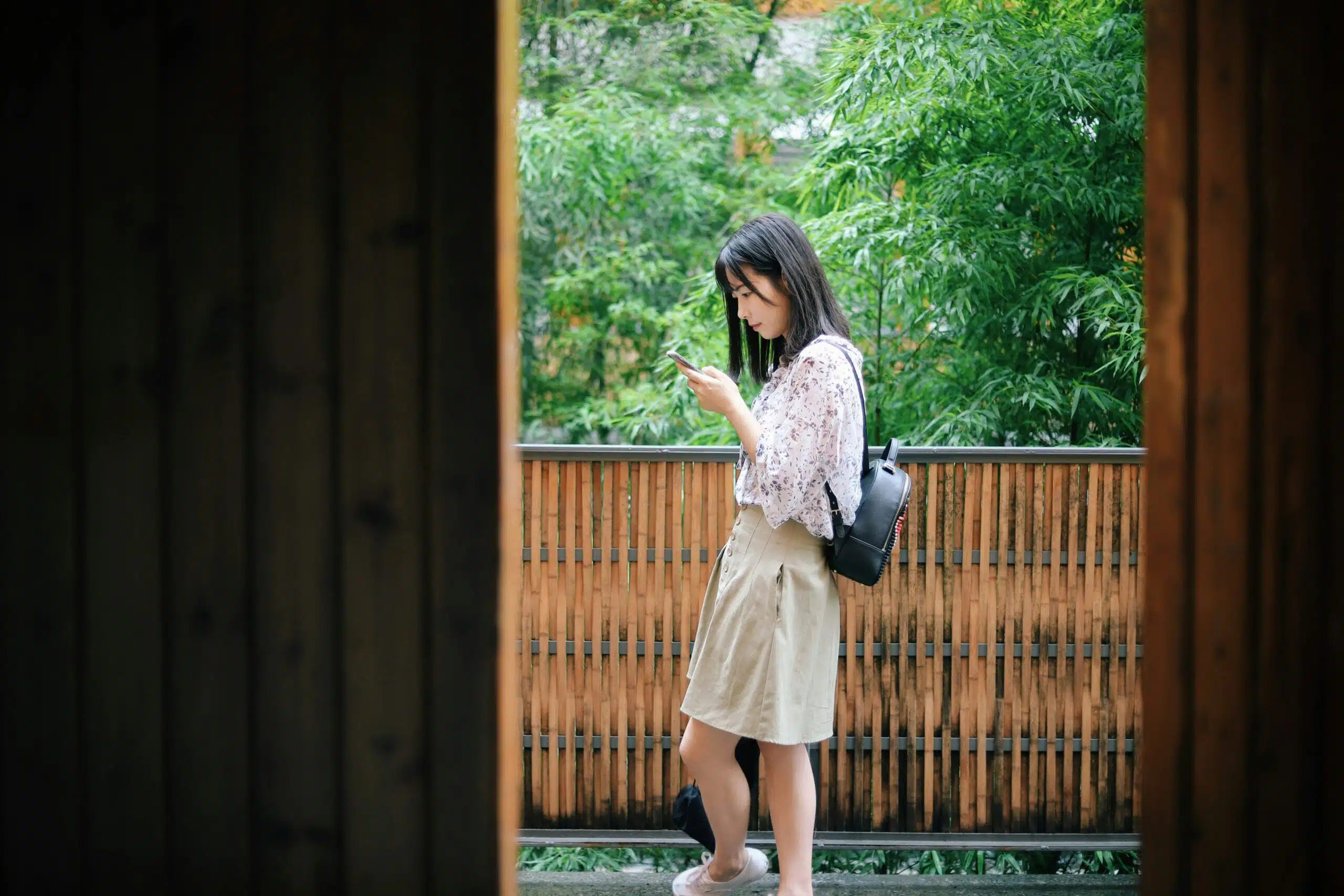 a woman using her phone