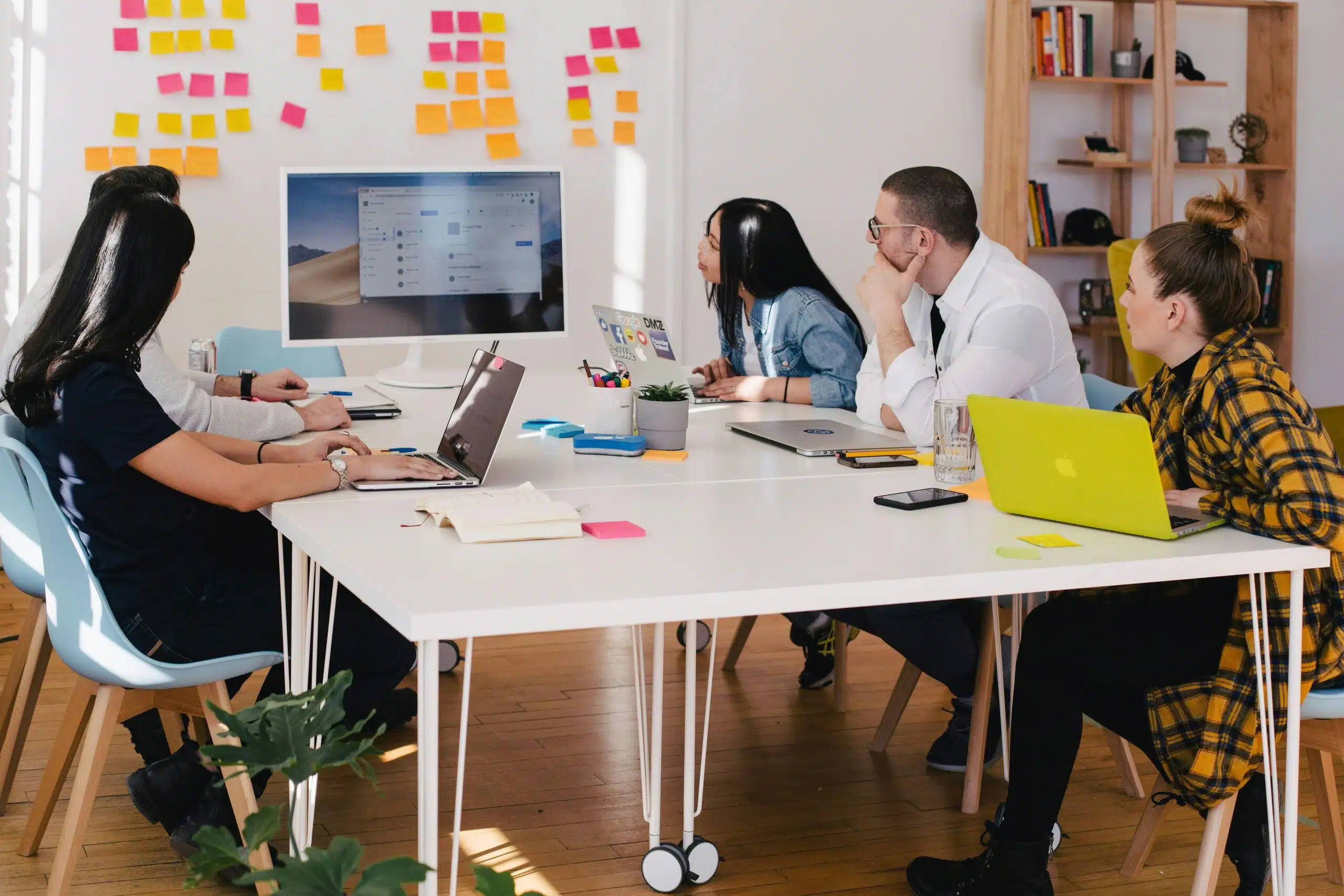 Team collaborating in a meeting, discussing AI-powered market insights