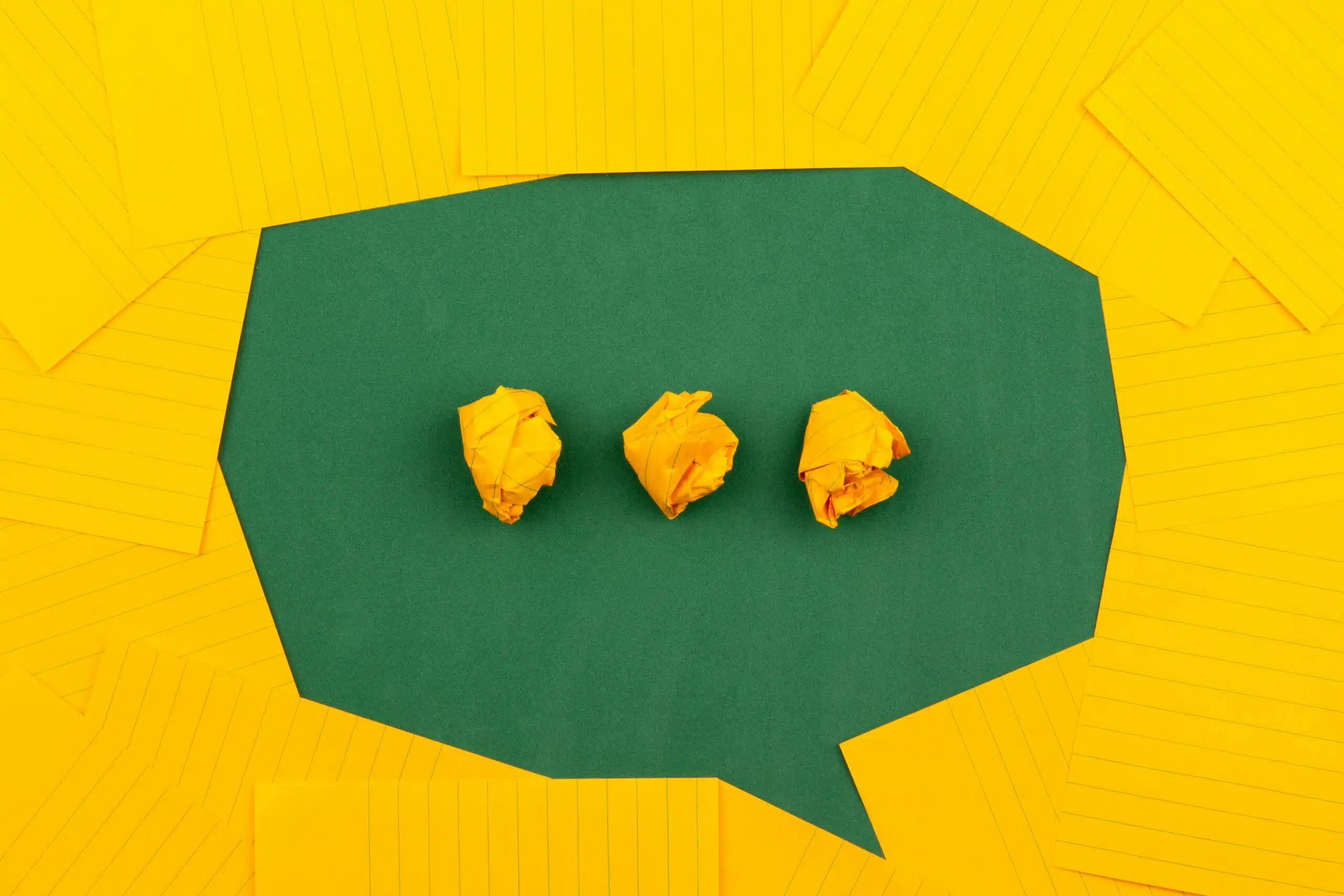 a chat symbol with yellow background