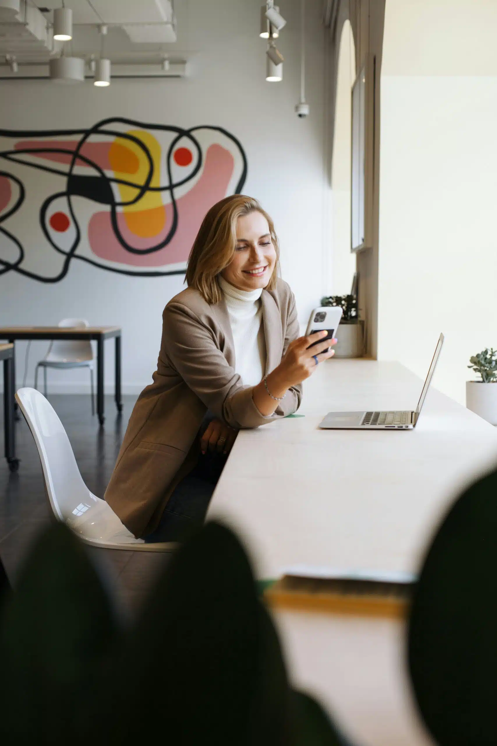 a woman using a chatbot on her phone