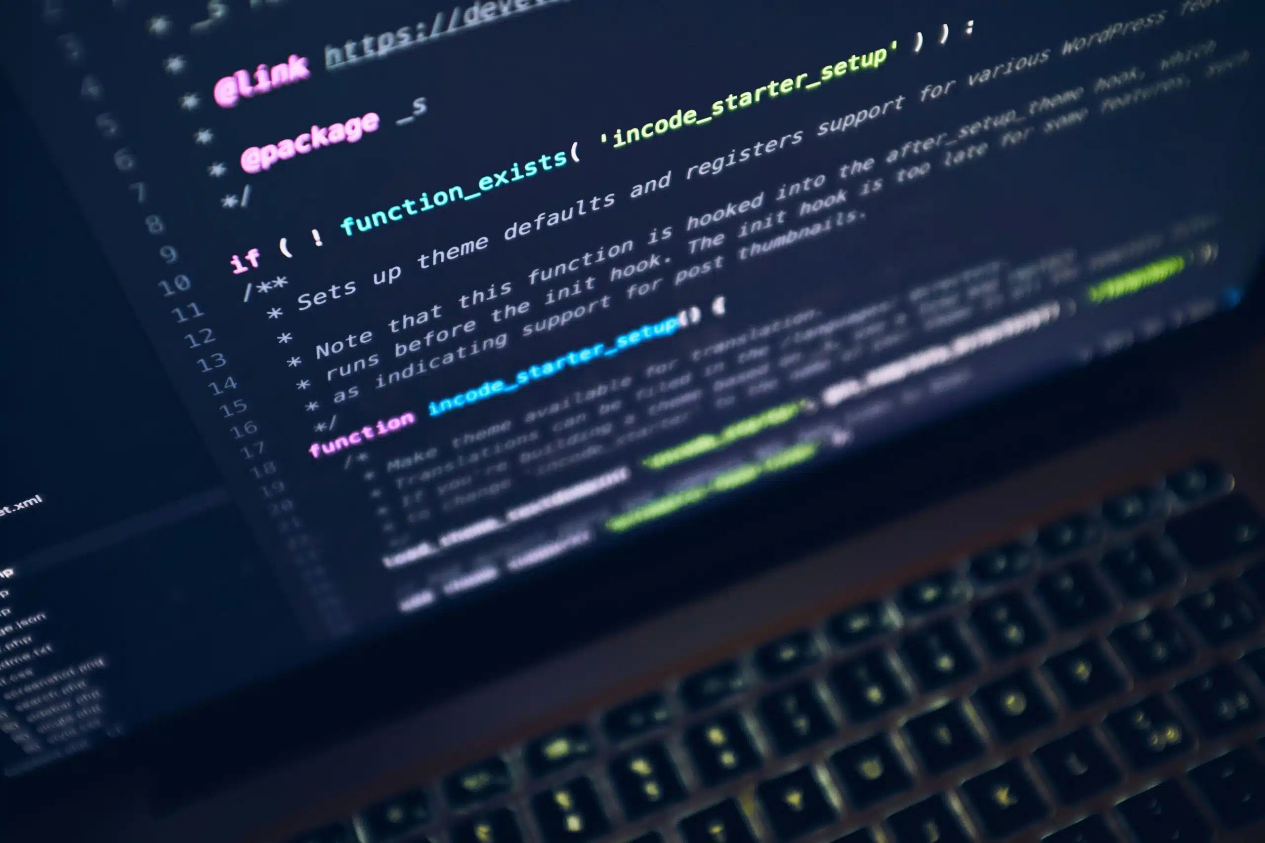 a closeup picture of a laptop with code on it