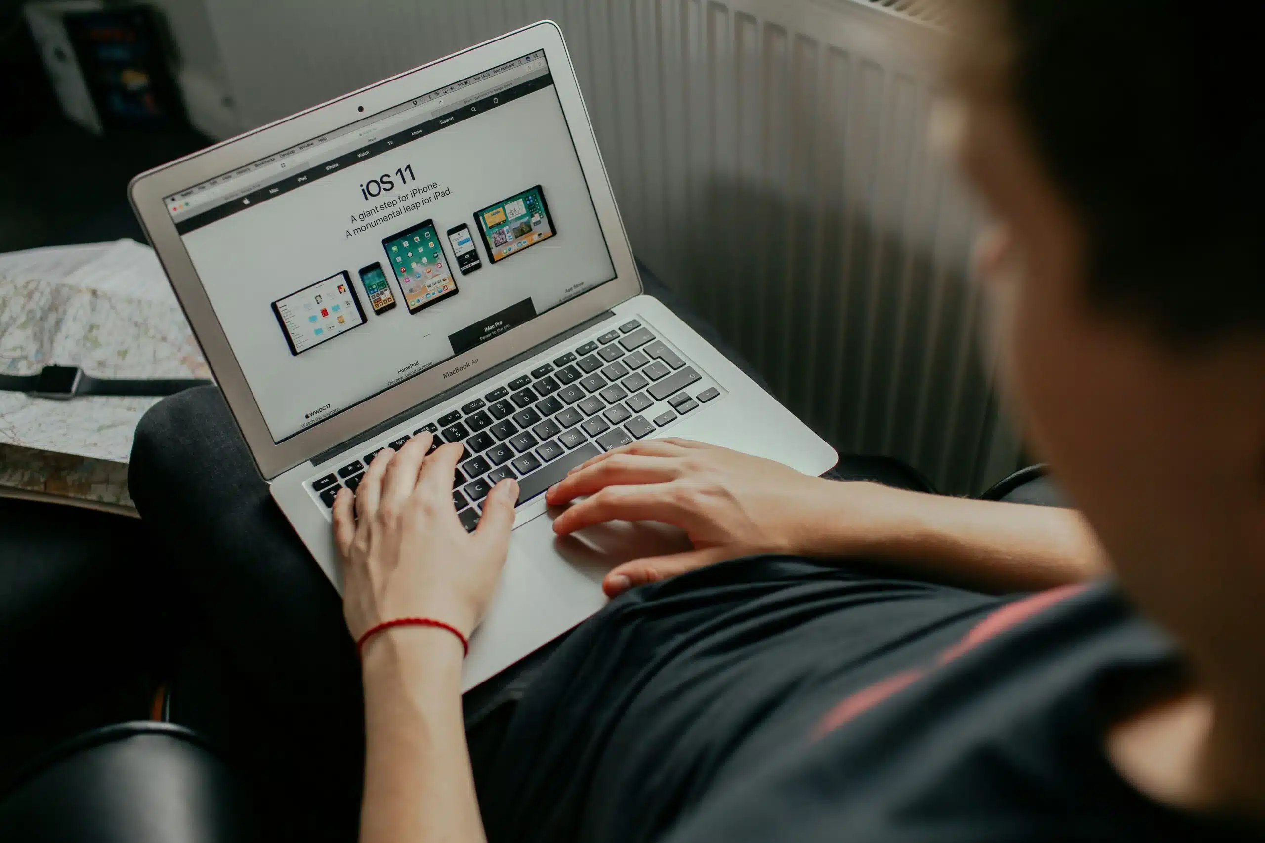 a guy working on a laptop