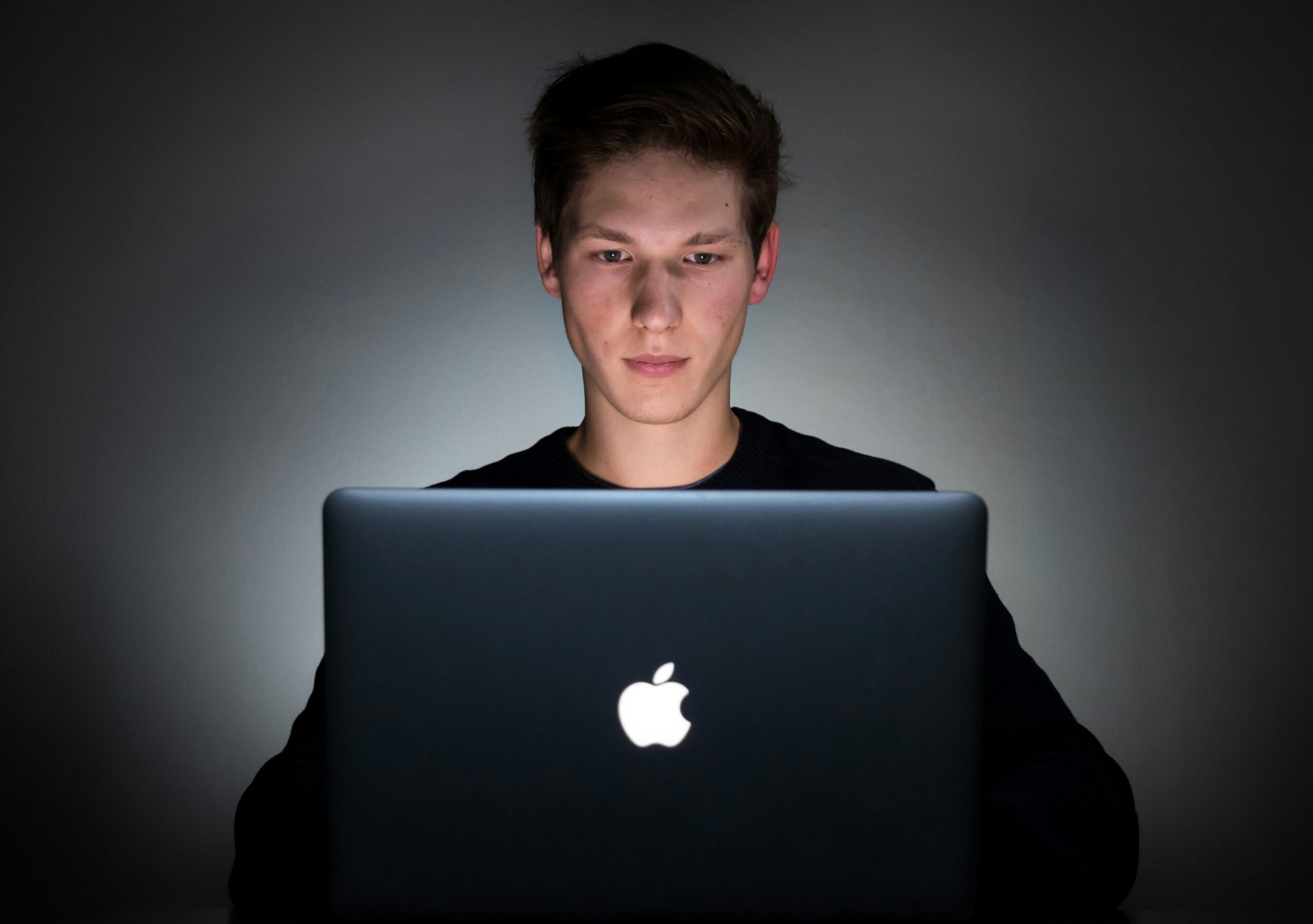 a person on their laptop - AI Marketing Tools a person on their laptop