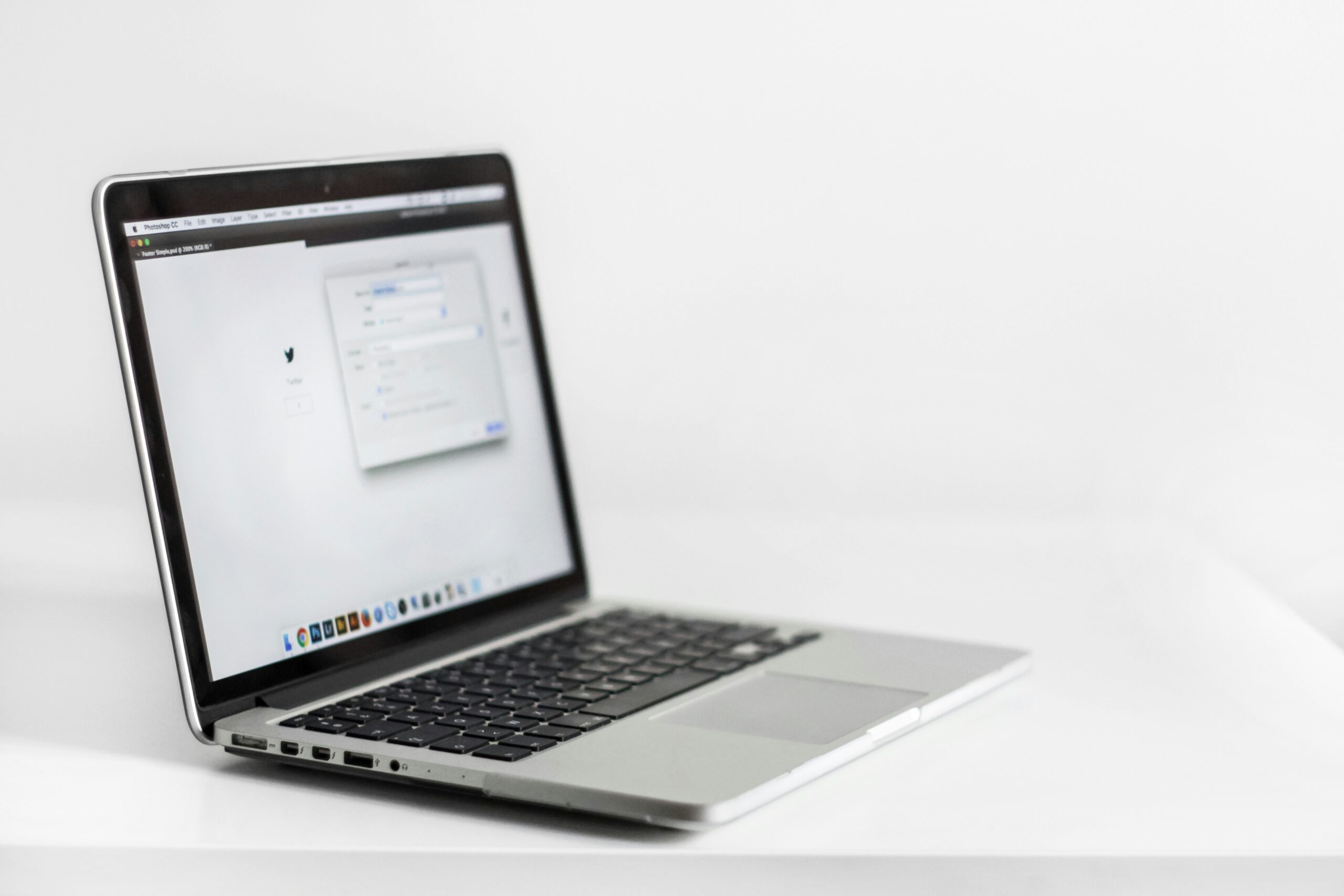 laptop placed on a white desk with ai marketing tool open - AI Marketing Tools laptop placed on a white desk with ai marketing tool open