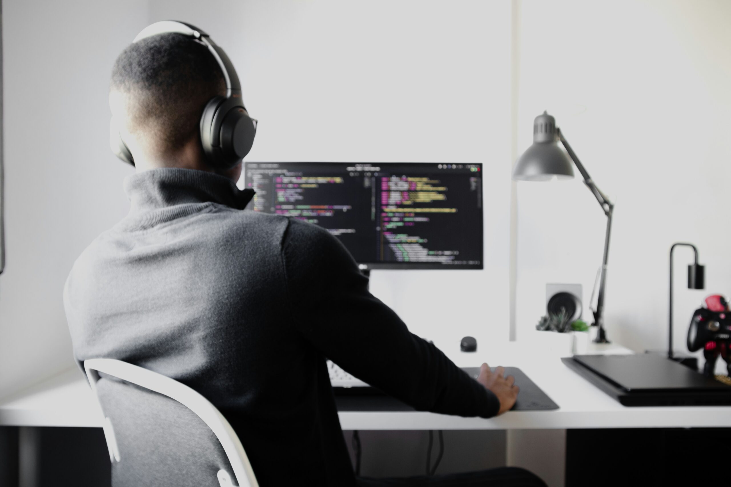 a professional working with a desktop computer - AI Marketing Tools a professional working with a desktop computer
