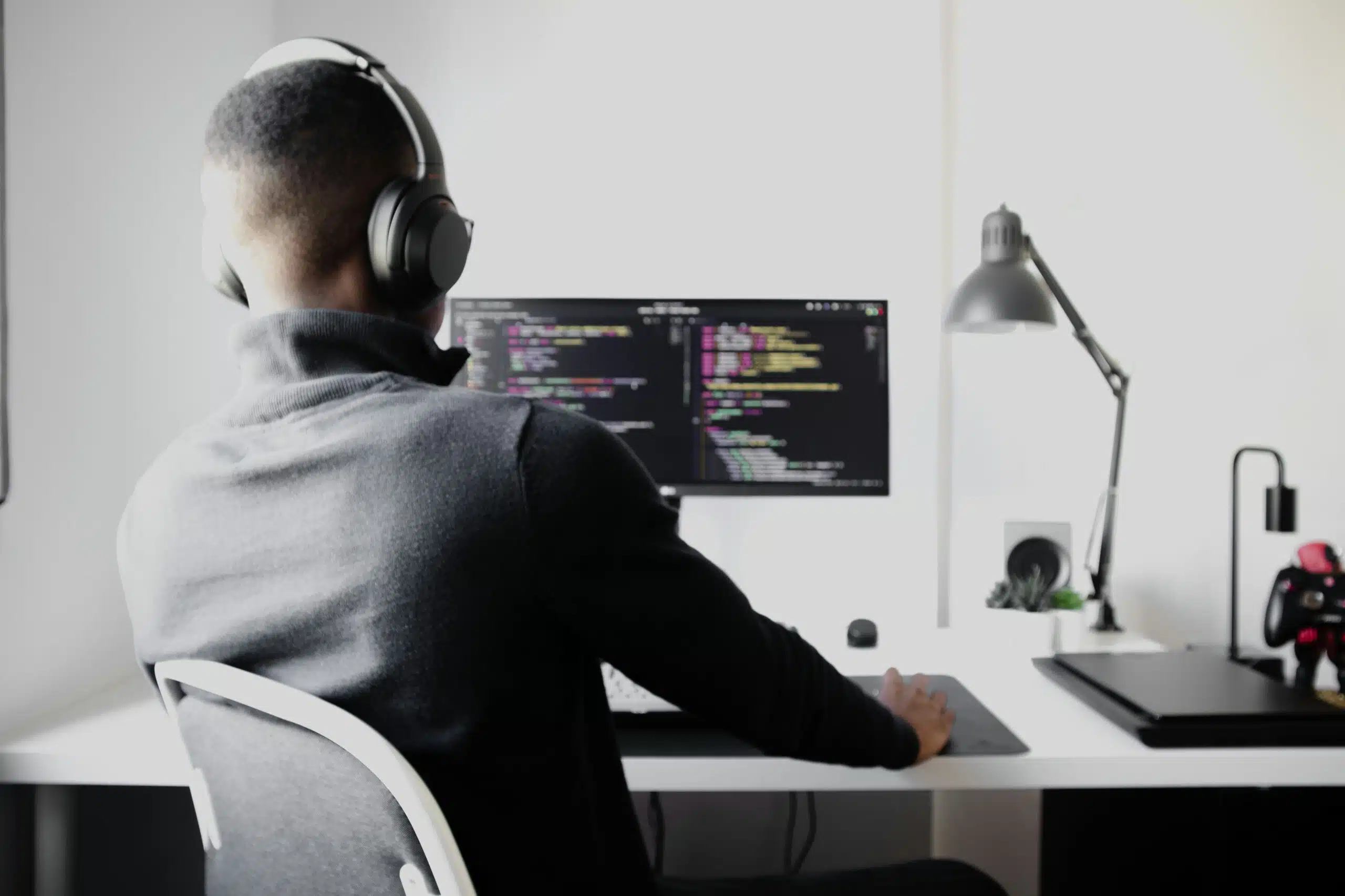 a professional working with a desktop computer