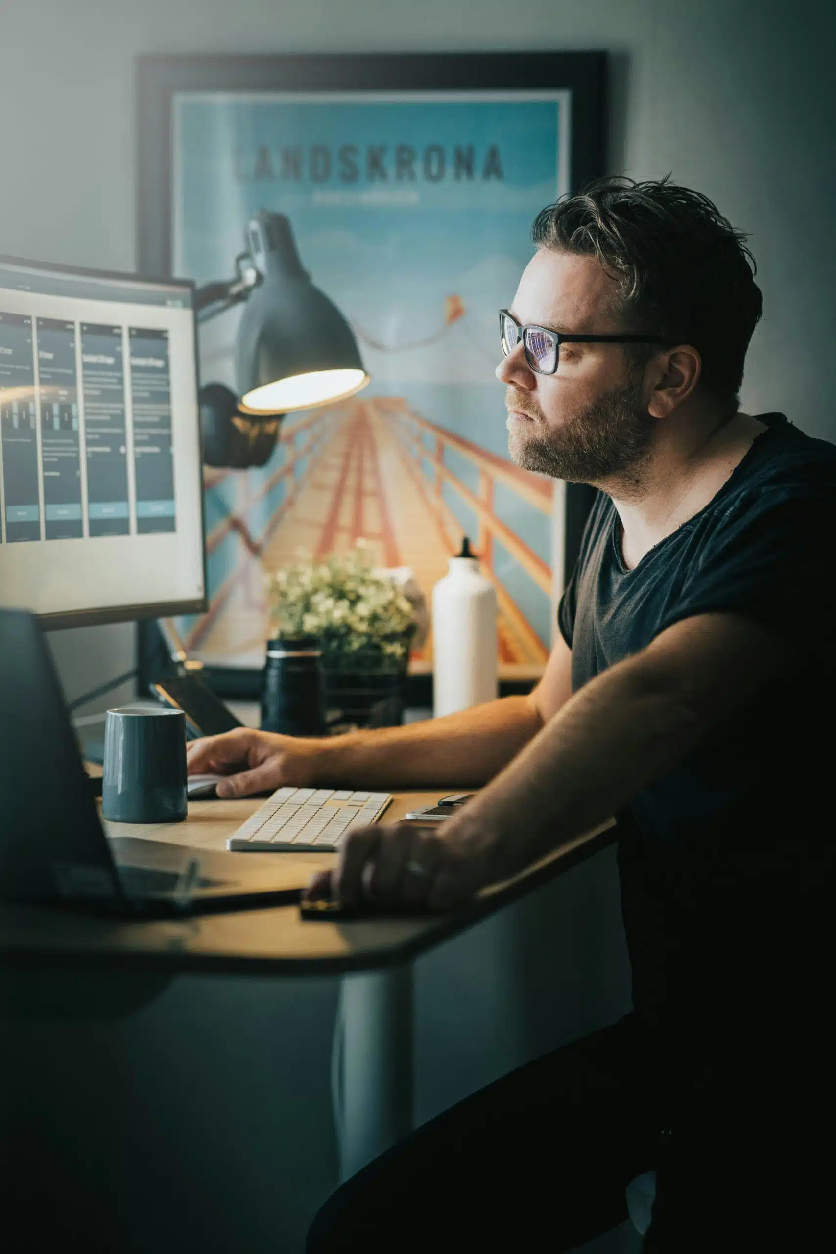 A marketer focused on the computer screen