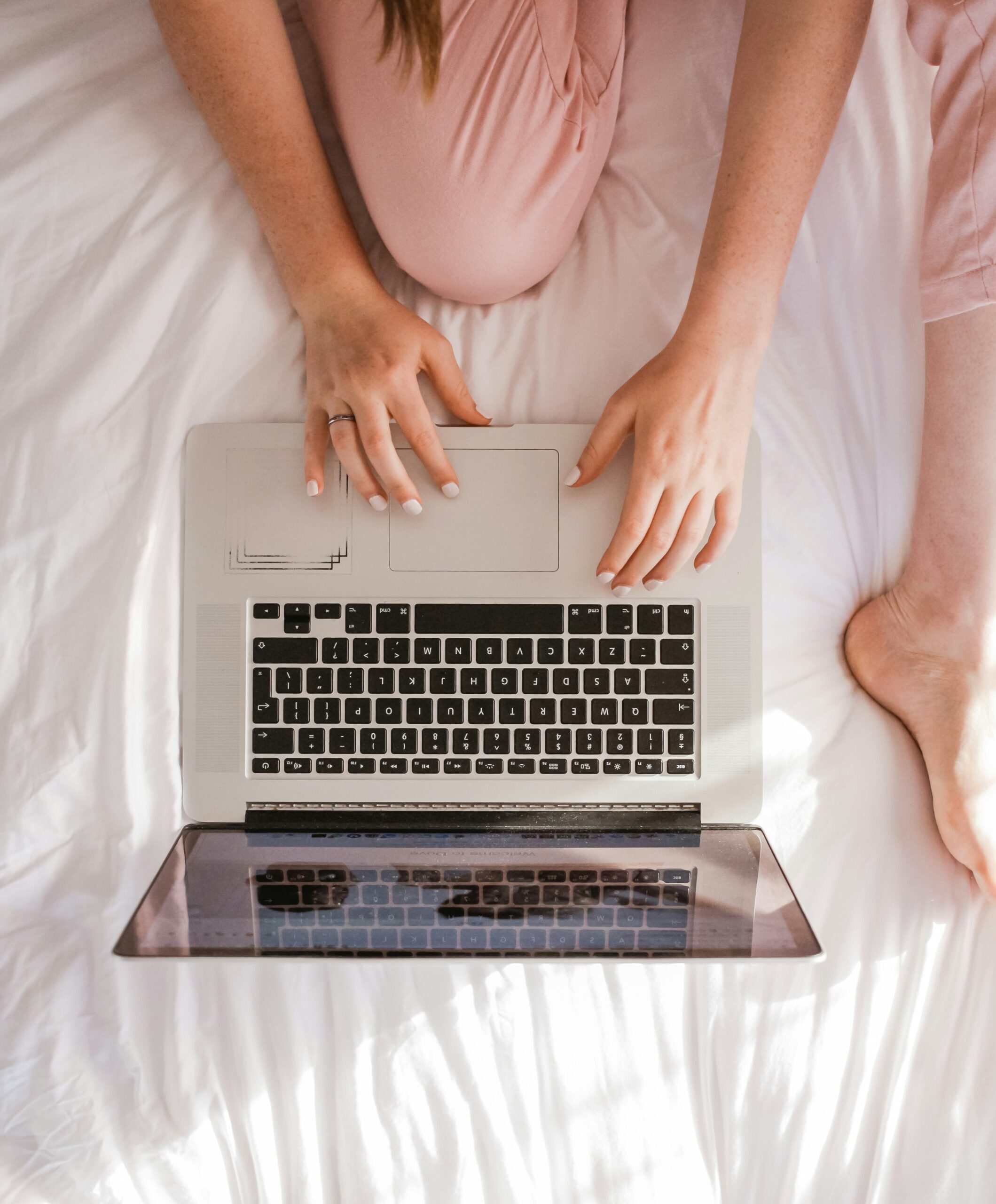 a woman working on her laptop - AI Marketing Tools a woman working on her laptop
