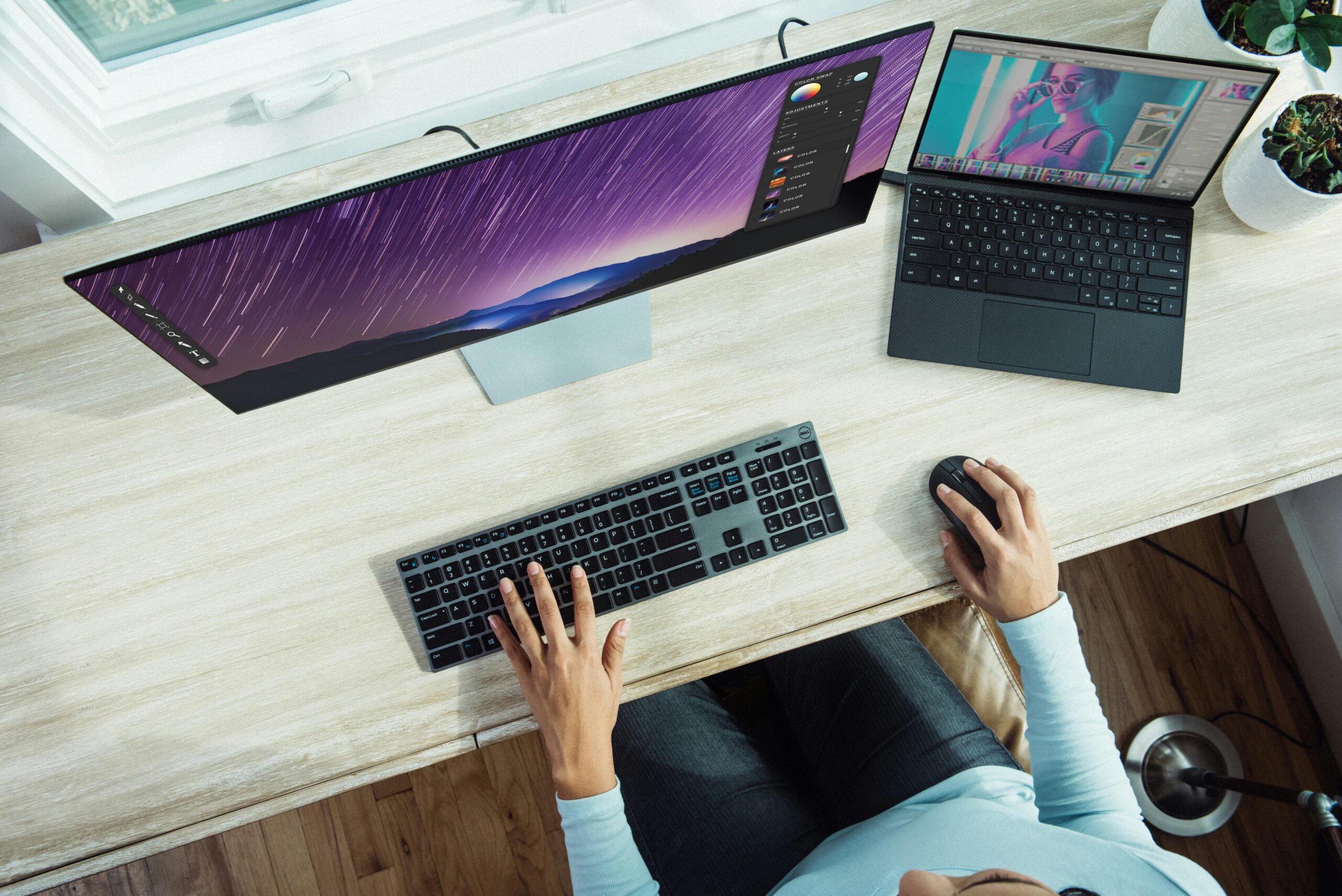 overhead view of an office desk with a person working - AI Marketing Tools overhead view of an office desk with a person working