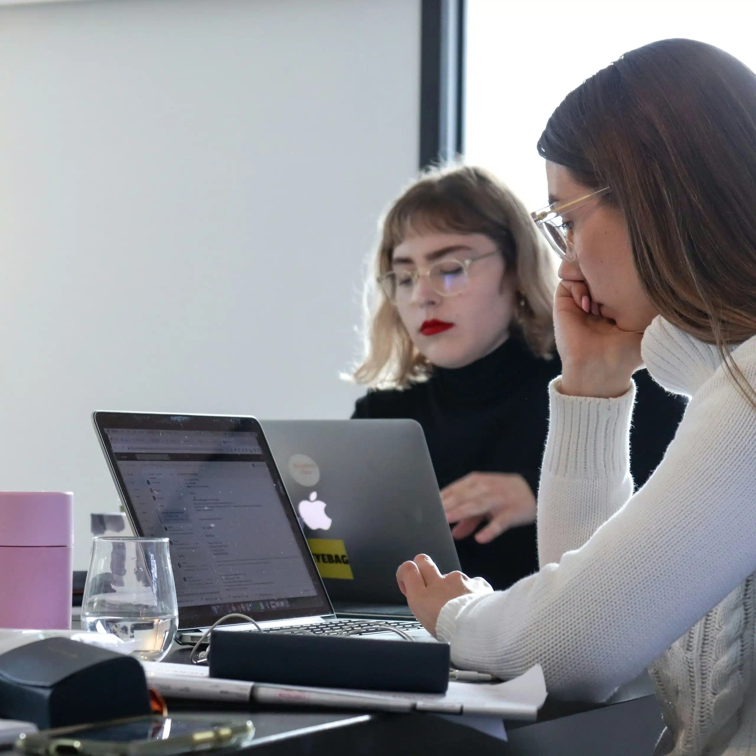 a marketing team working in a bright lit office