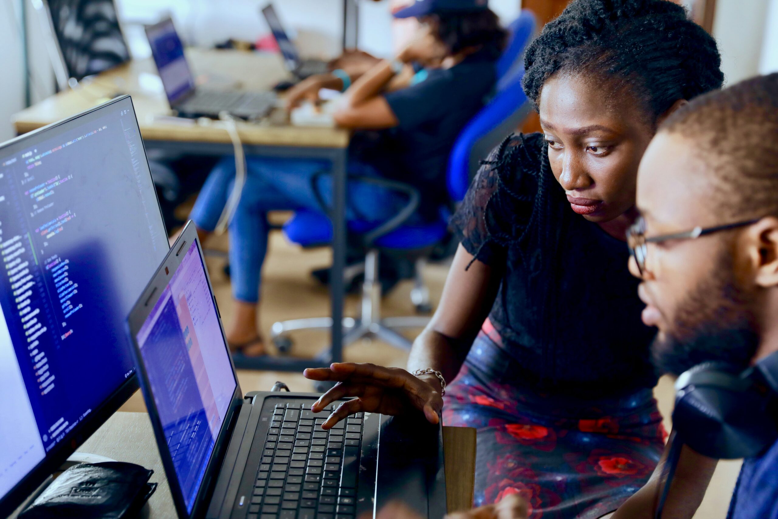 Team collaborating on machine learning algorithms for ad targeting - AI Marketing Tools Team collaborating on machine learning algorithms for ad targeting