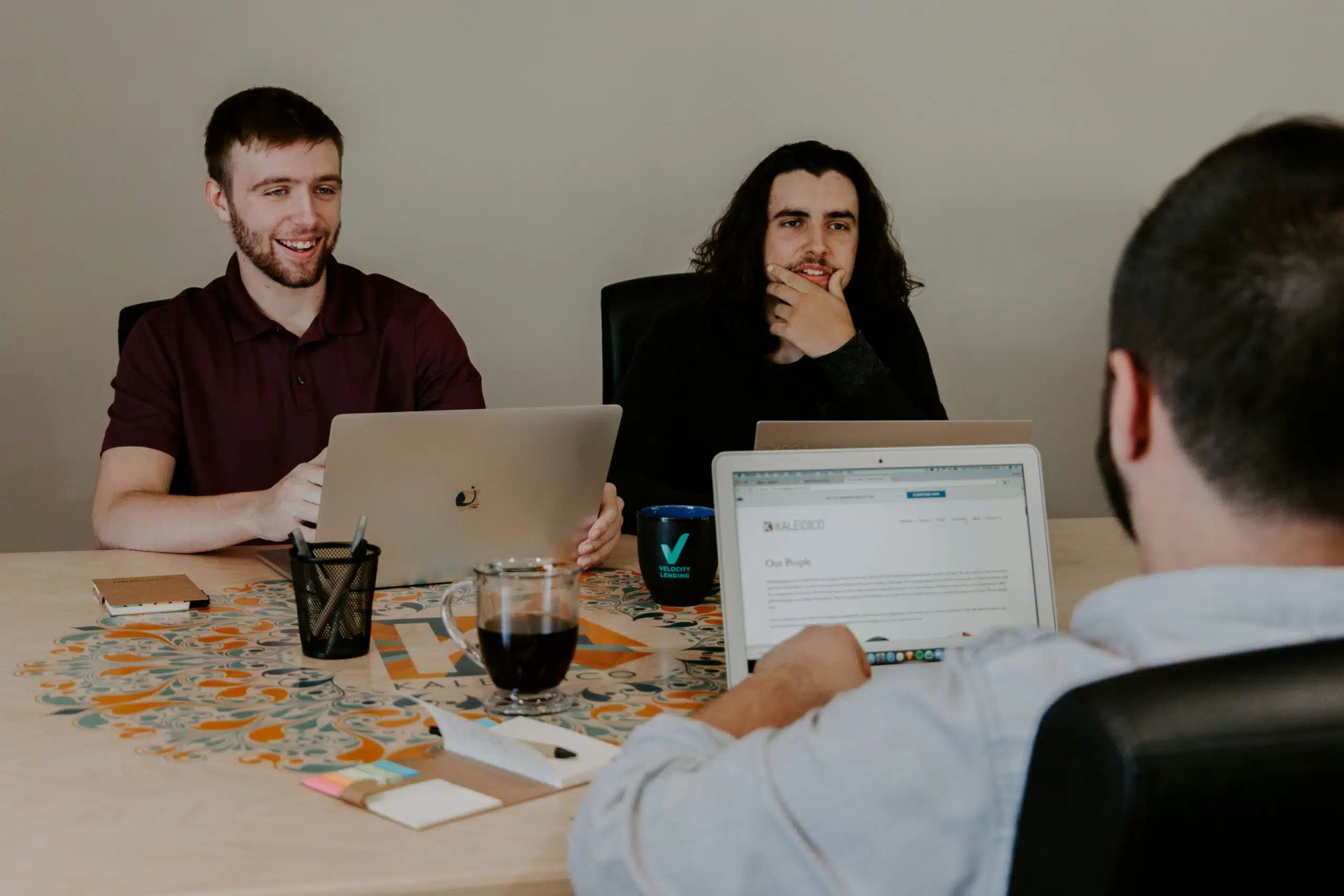 Marketing team discussing machine learning implementation in campaigns
