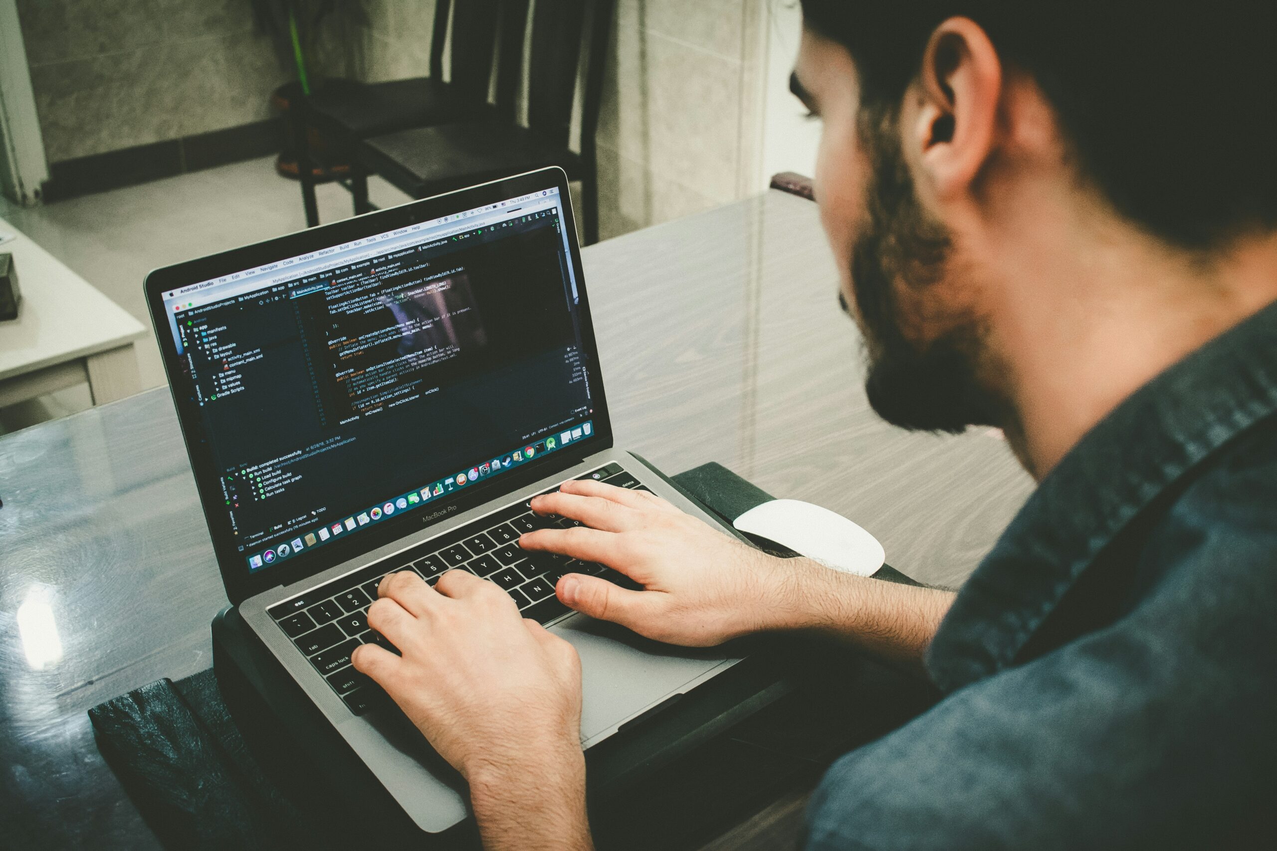 Developer writing machine learning code for marketing automation - AI Marketing Tools Developer writing machine learning code for marketing automation